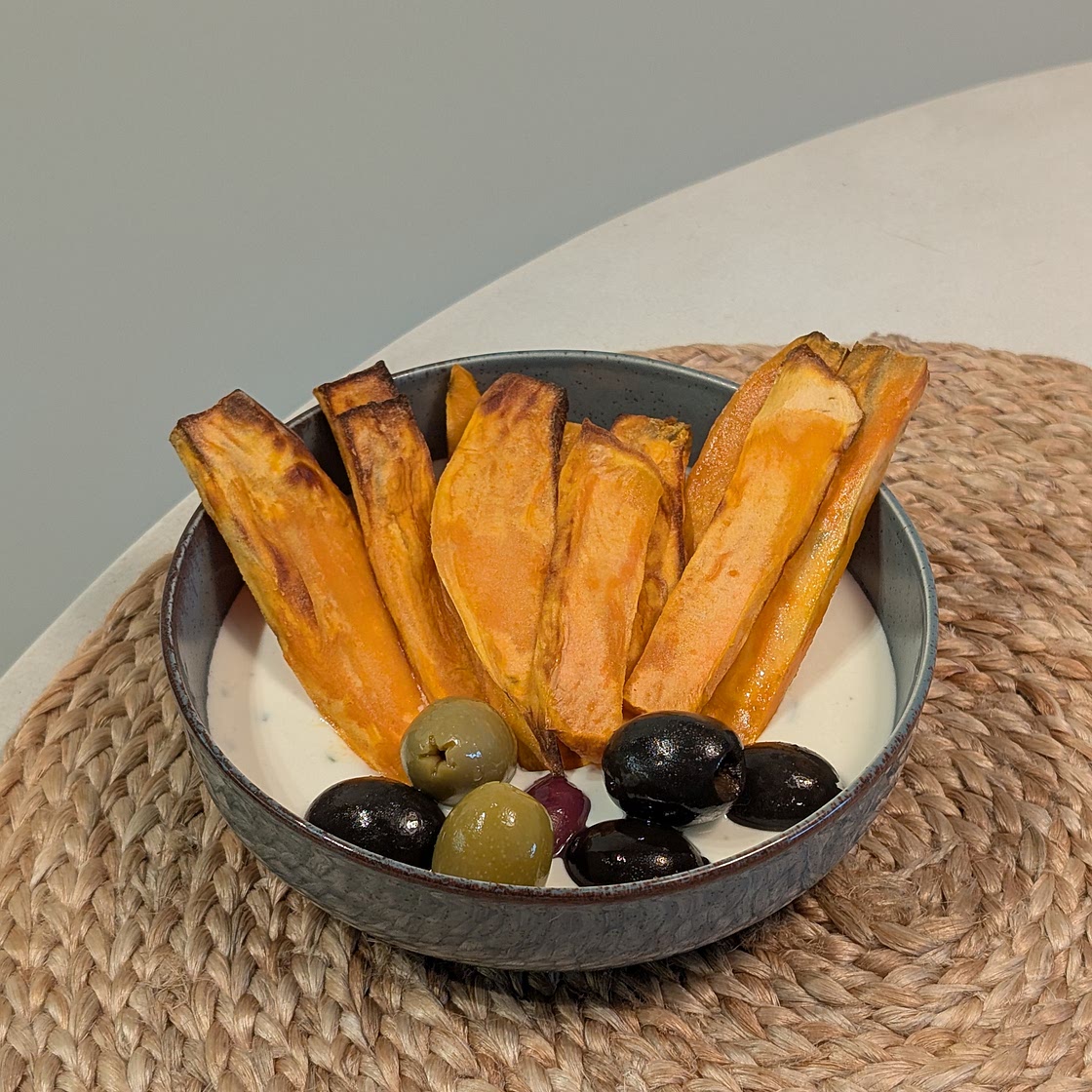 Sweet potato with feta-yoghurt dressing and olives