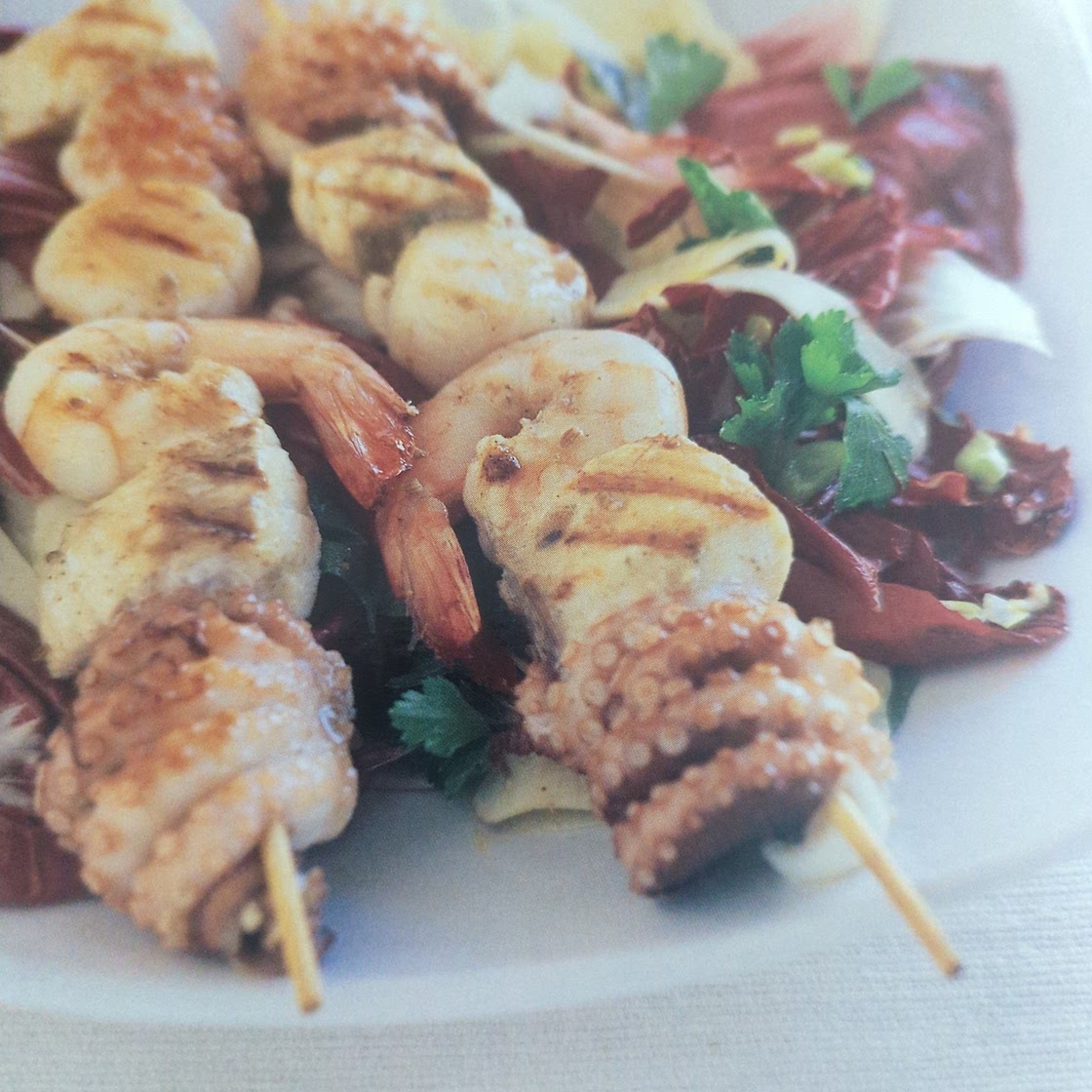 Seafood skewers with radicchio and fennel salad