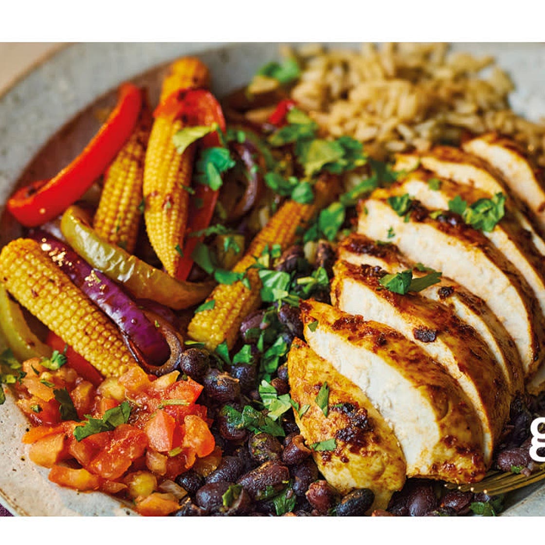 Fajita chicken rice bowl with burnt lime