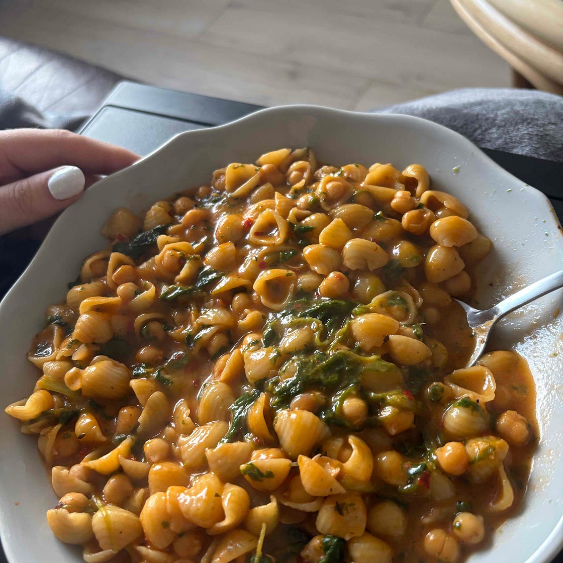 Brothy pasta with beans and greens
