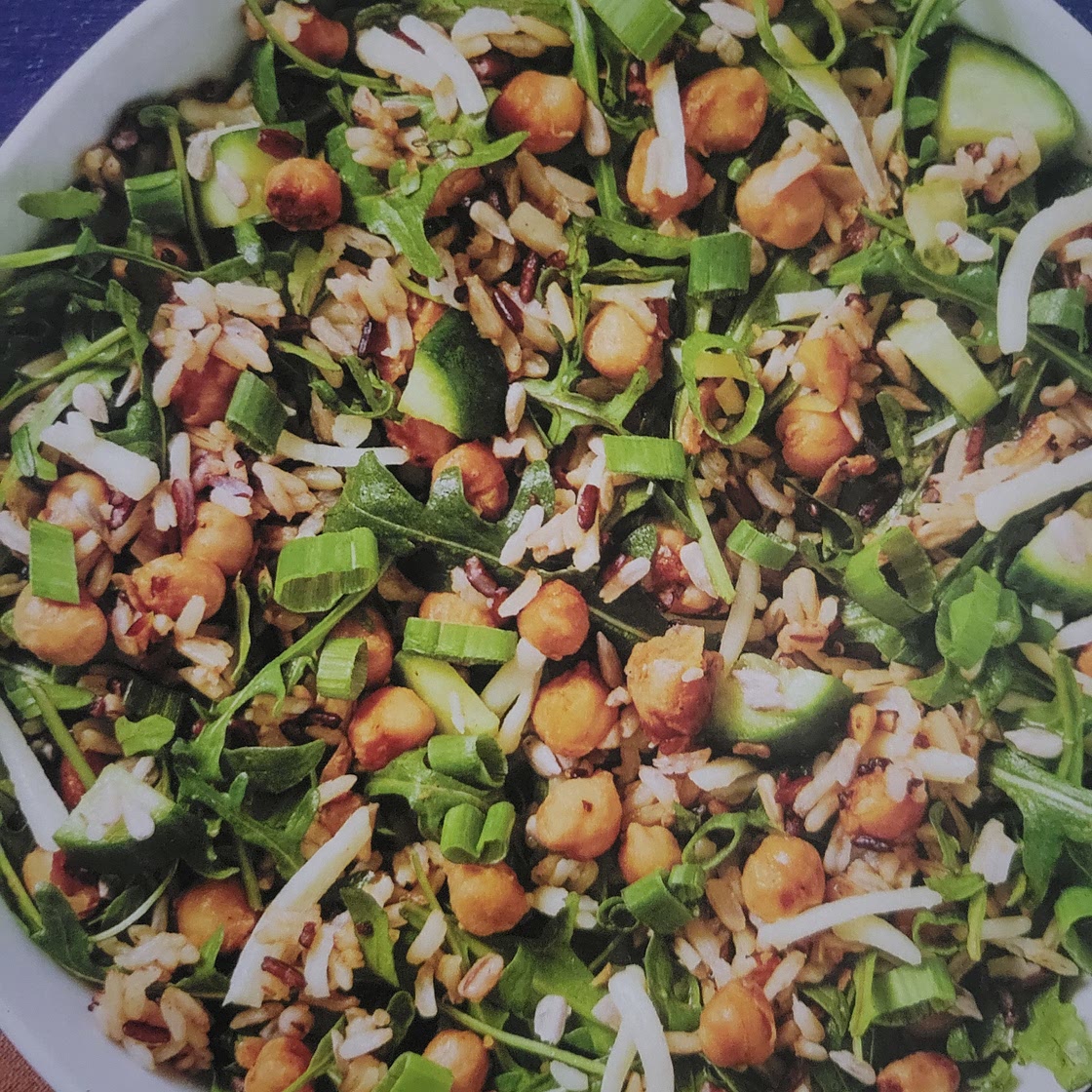 Lemony chickpea and arugula grain salad with cucumber cheddar and sunflower seeds