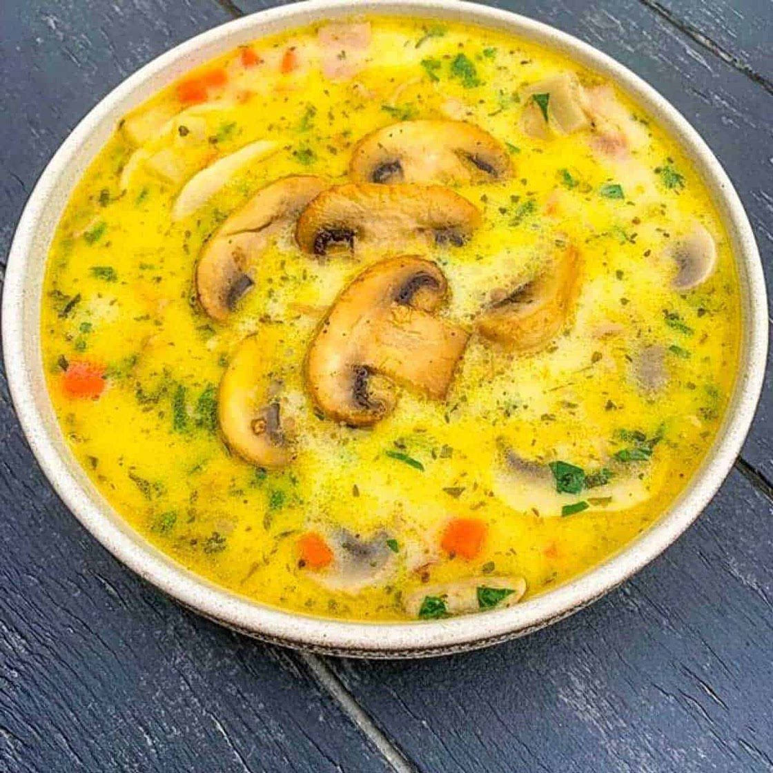 Creamy mushroom soup with fresh herbs
