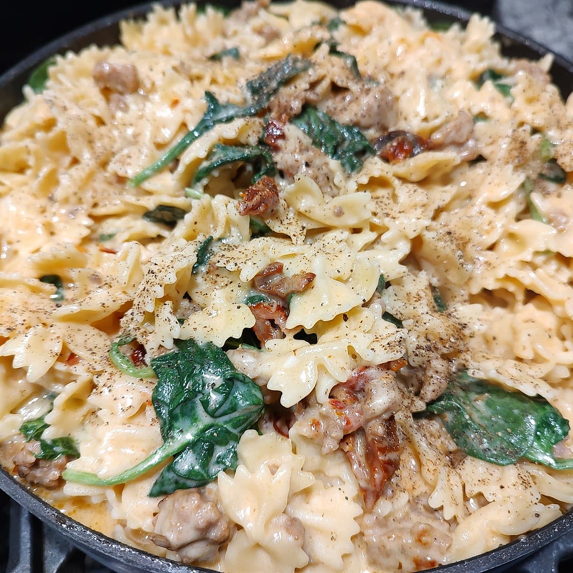 Creamy Pasta with Italian Sausage, Sun-Dried Tomatoes and Spinach