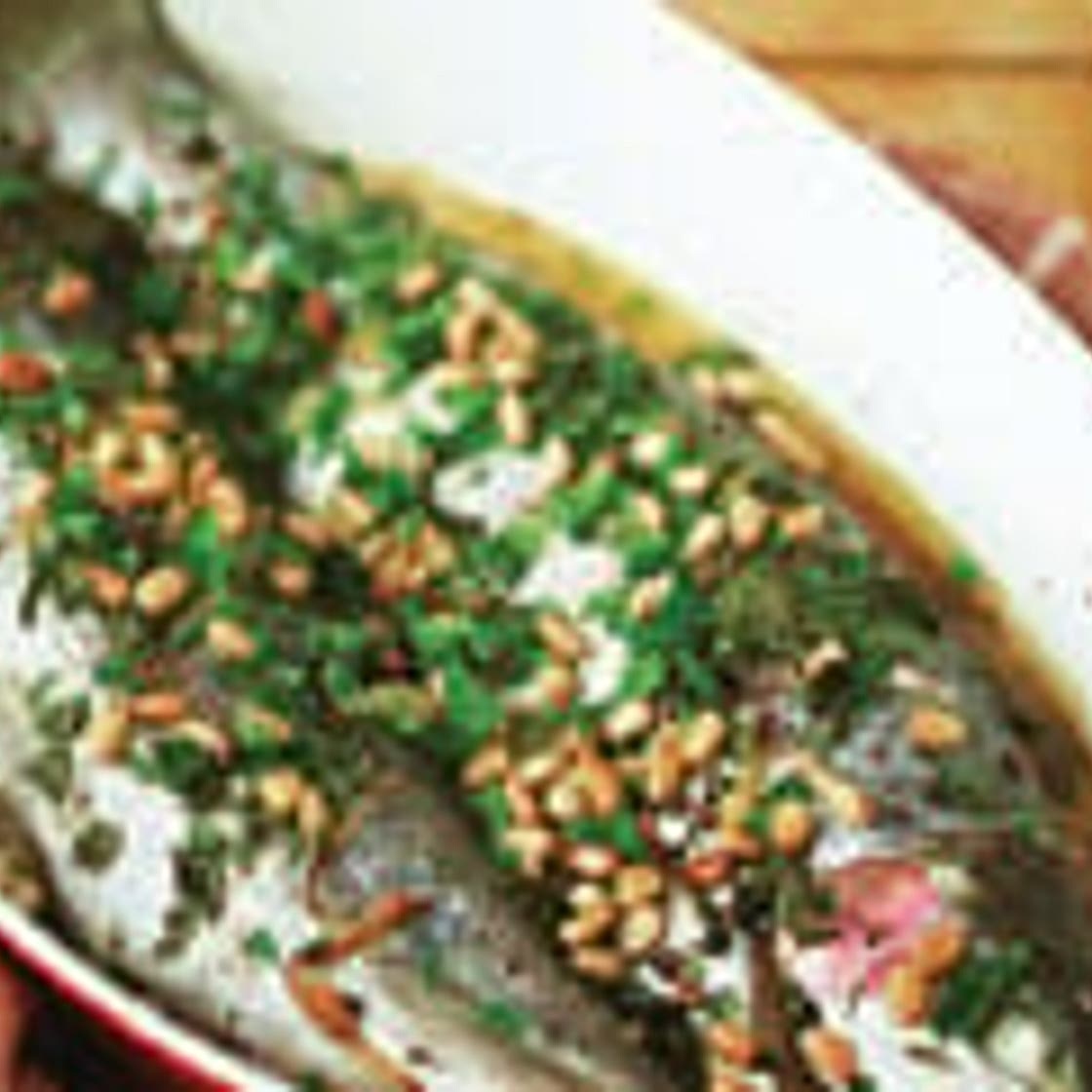 Lemon baked rainbow trout with pine nuts