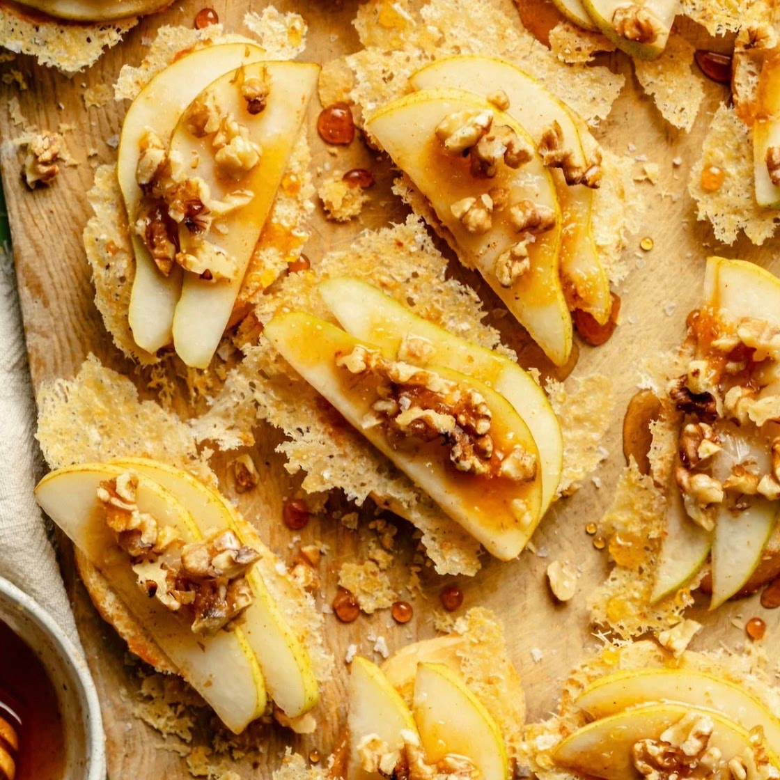 Parmesan crusted crostini with pear and walnut