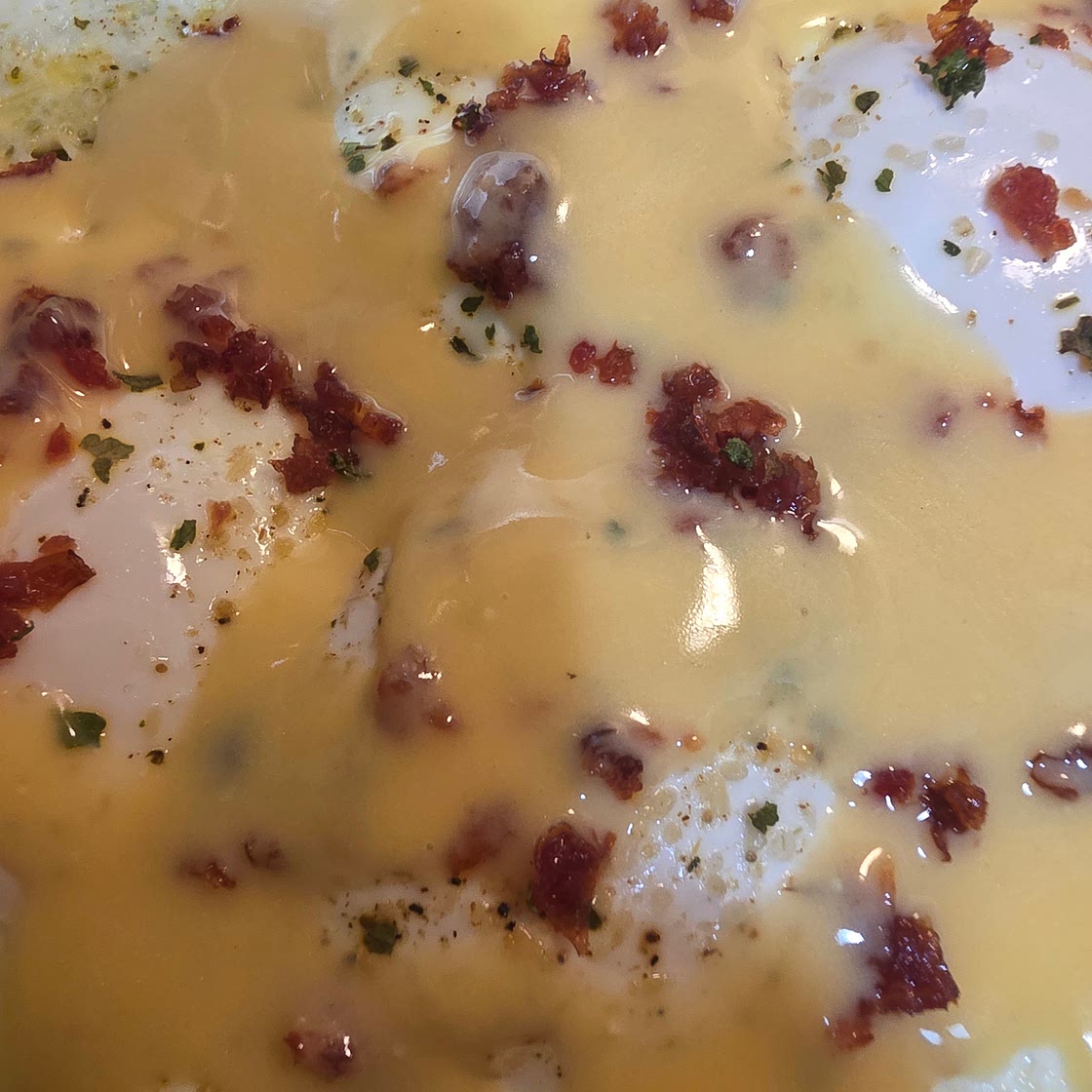 Sunny Steamed Eggs With Hollandaise And Jerkey Pieces