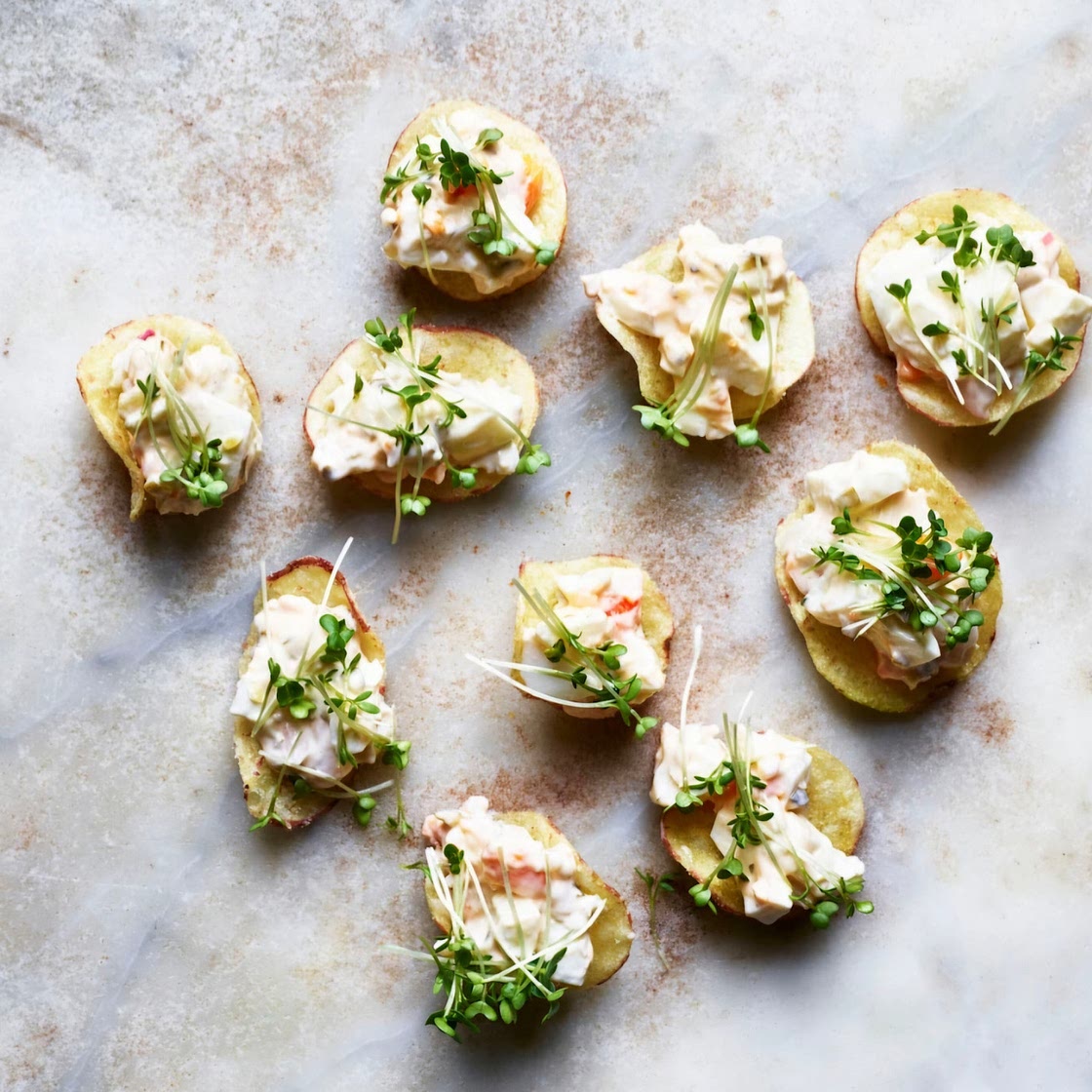 Egg salad on salt and vinegar crisps