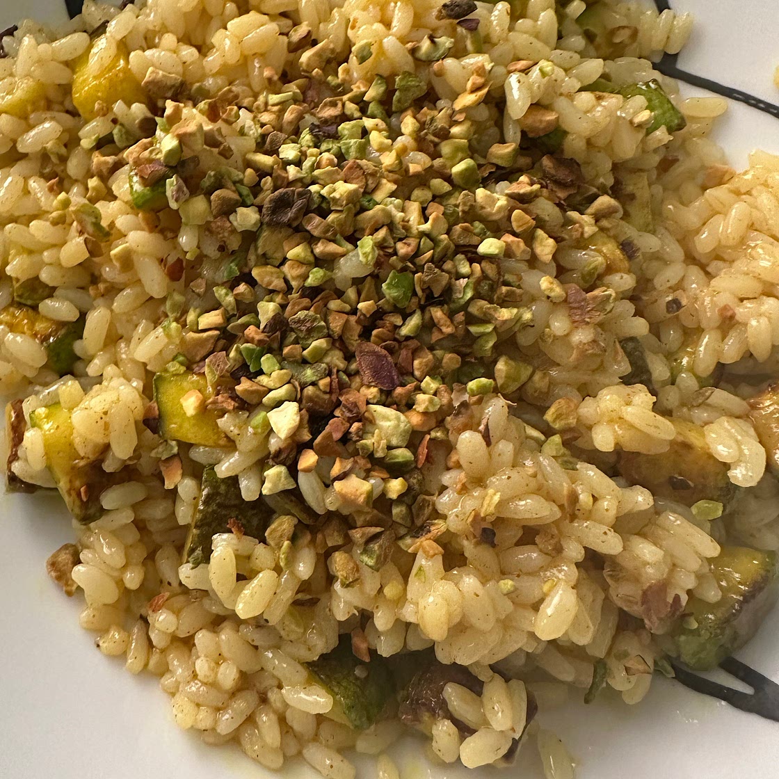 Riso con zucchine, mandorle tostate, paprika dolce e curcuma