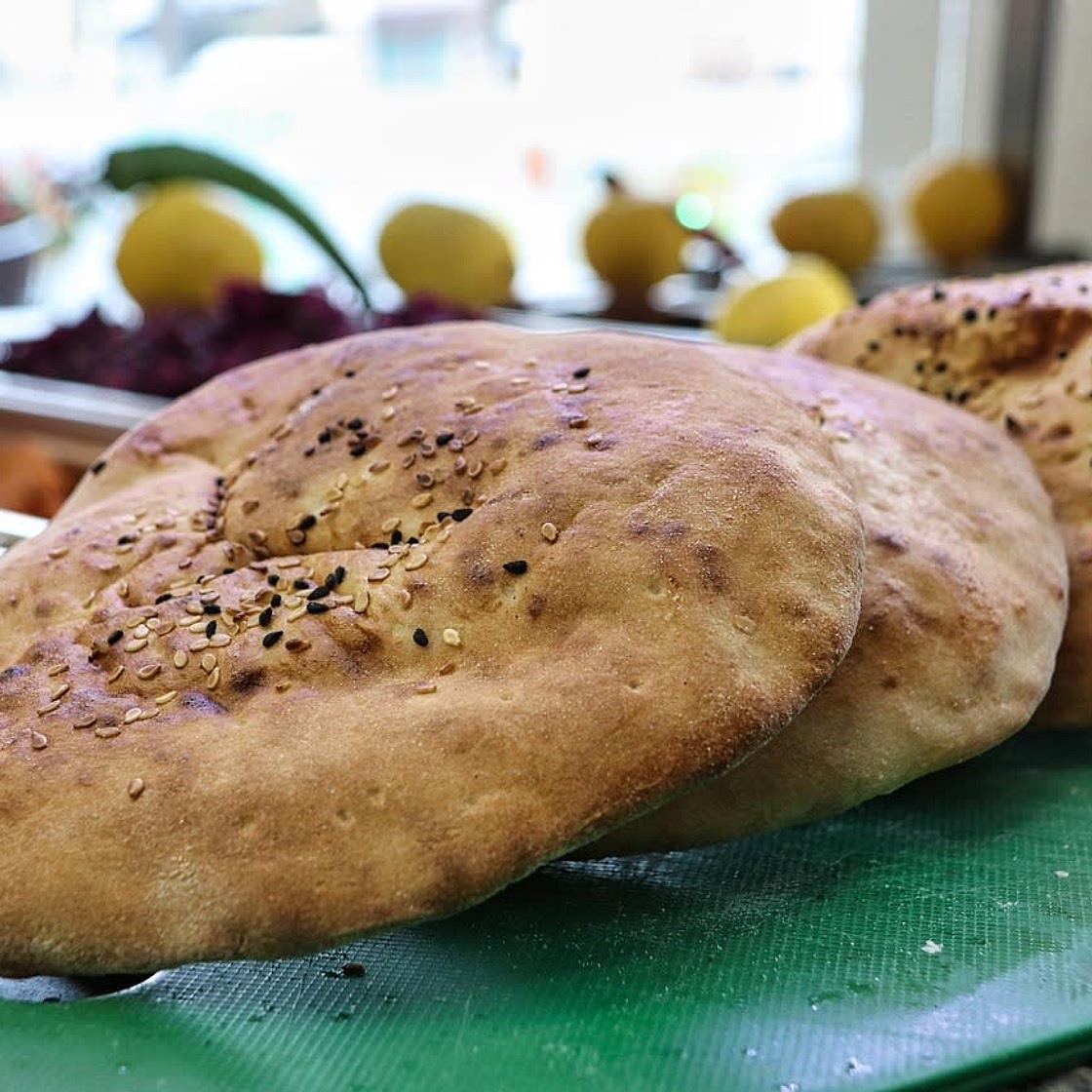 Pain pita au poulet mariné 