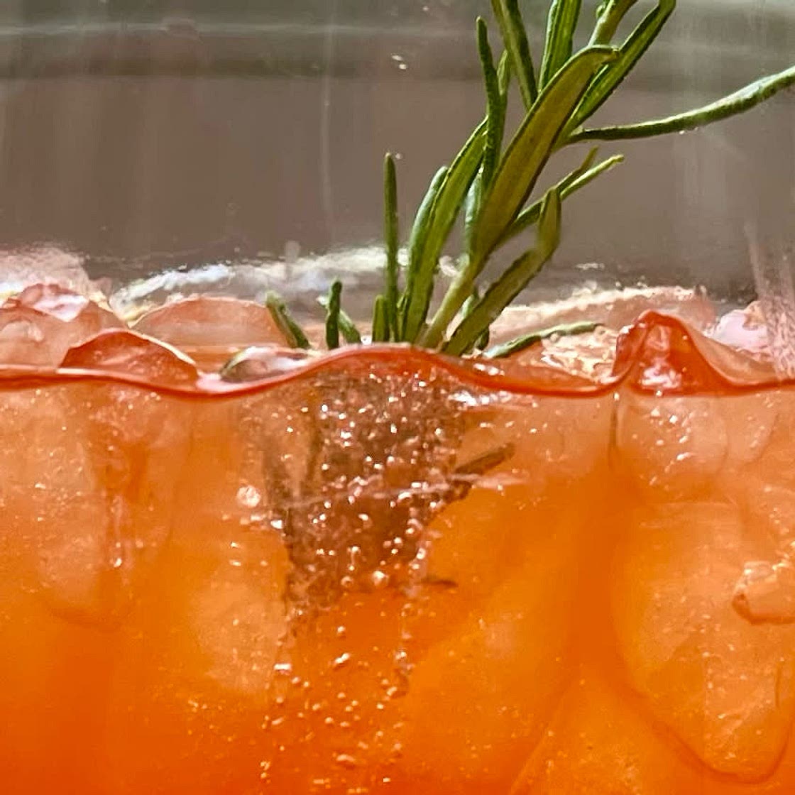 Grapefruit and rosemary aperol spritz
