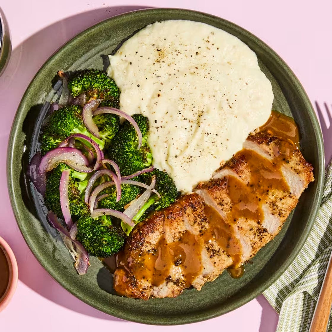 Dijon-Balsamic Pork Chops cheesy cauliflower mash, roasted broccoli & onion