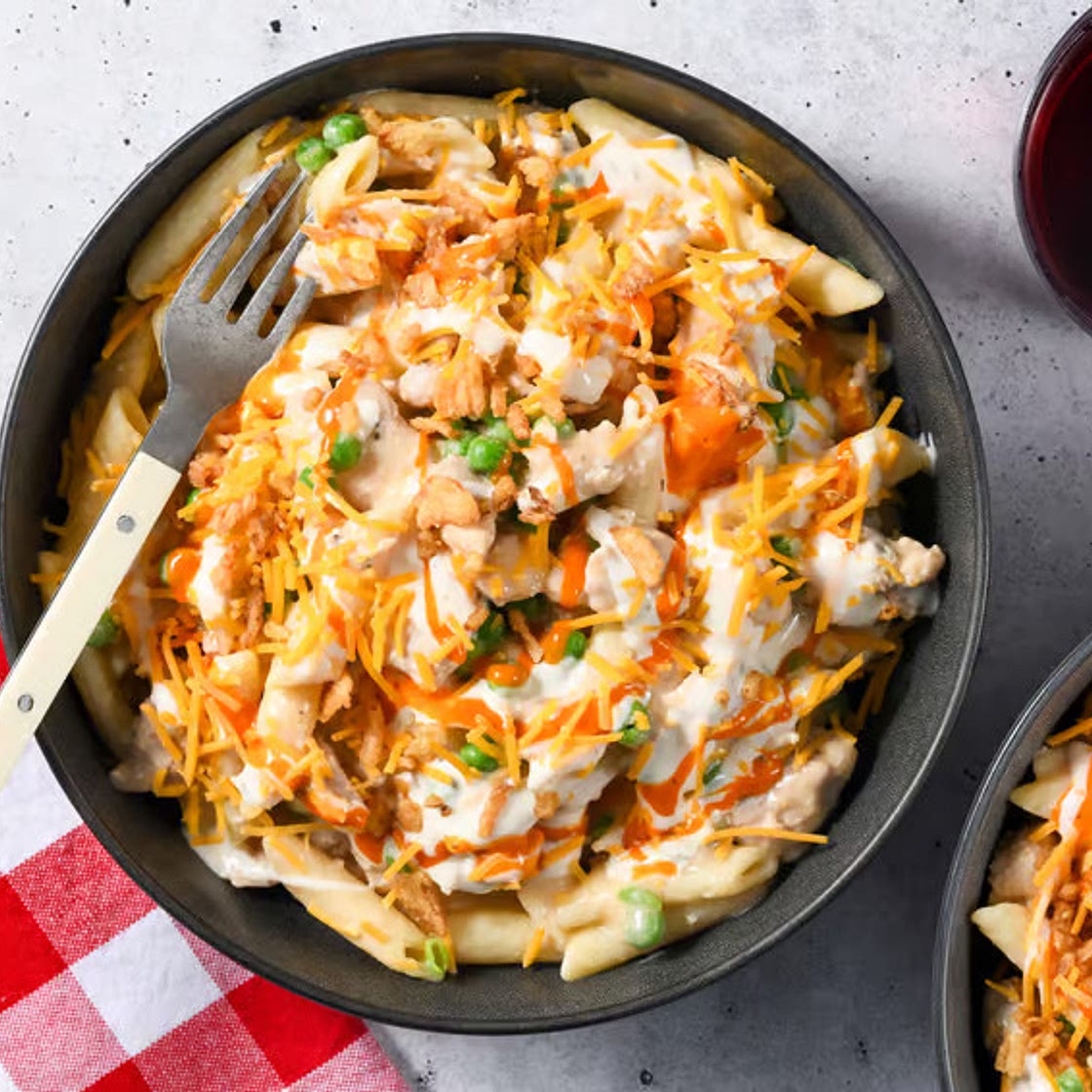 Zippy Buffalo Chicken Thigh Penne with crispy onions