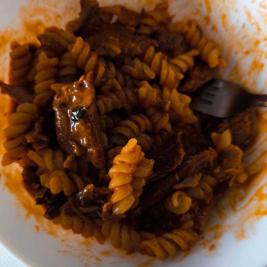 Pasta with herring in tomato sauce
