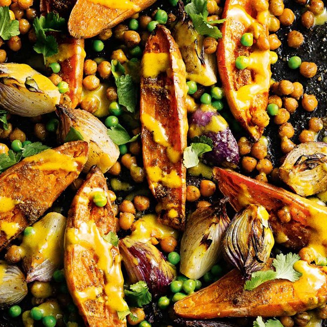 Spicy sweet potato and chickpea bake with lime tahini dressing