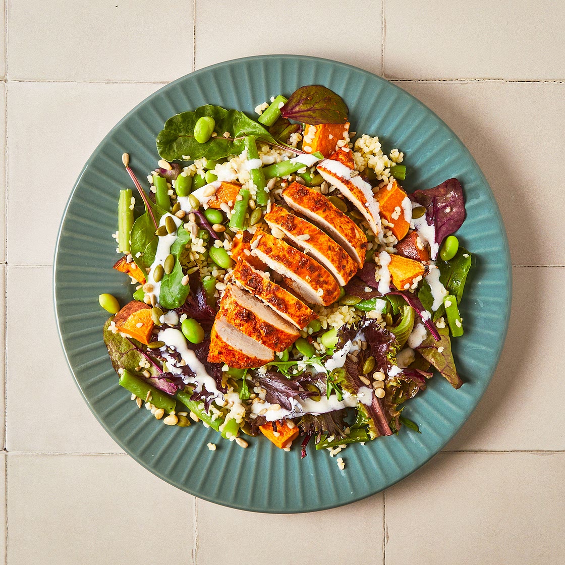Spicy Chicken, Roasted Sweet Potato & Greens Grain Bowl