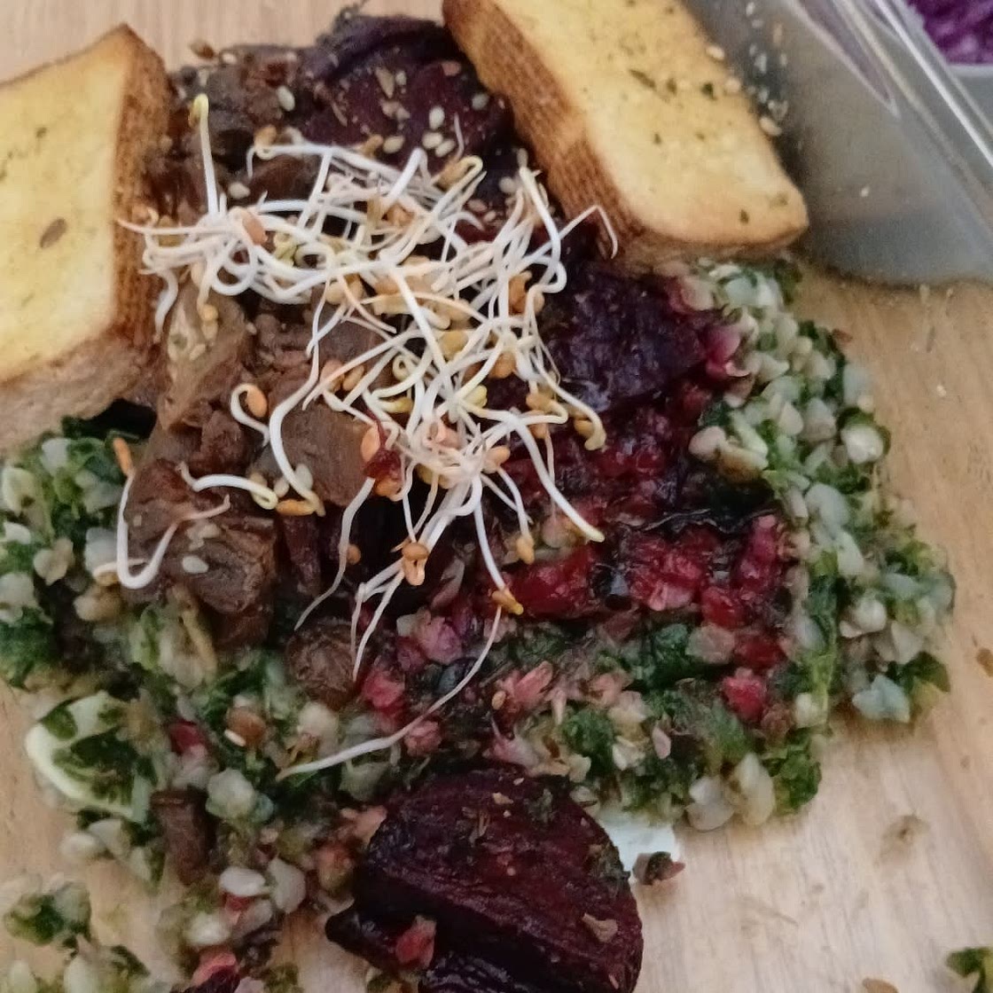 Buckwheat with roasted beets, mushrooms, spinach and halloumi
