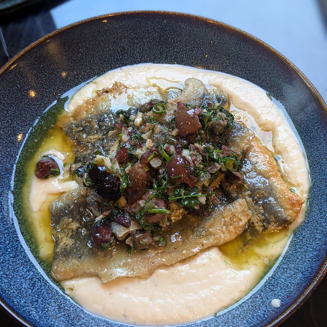 Sardine fillets, butter bean purée and a Sicilian-style pan sauce