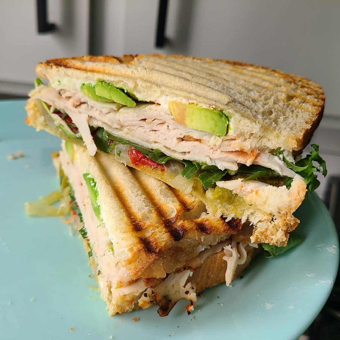 Avocado Turkey Pesto Paninis