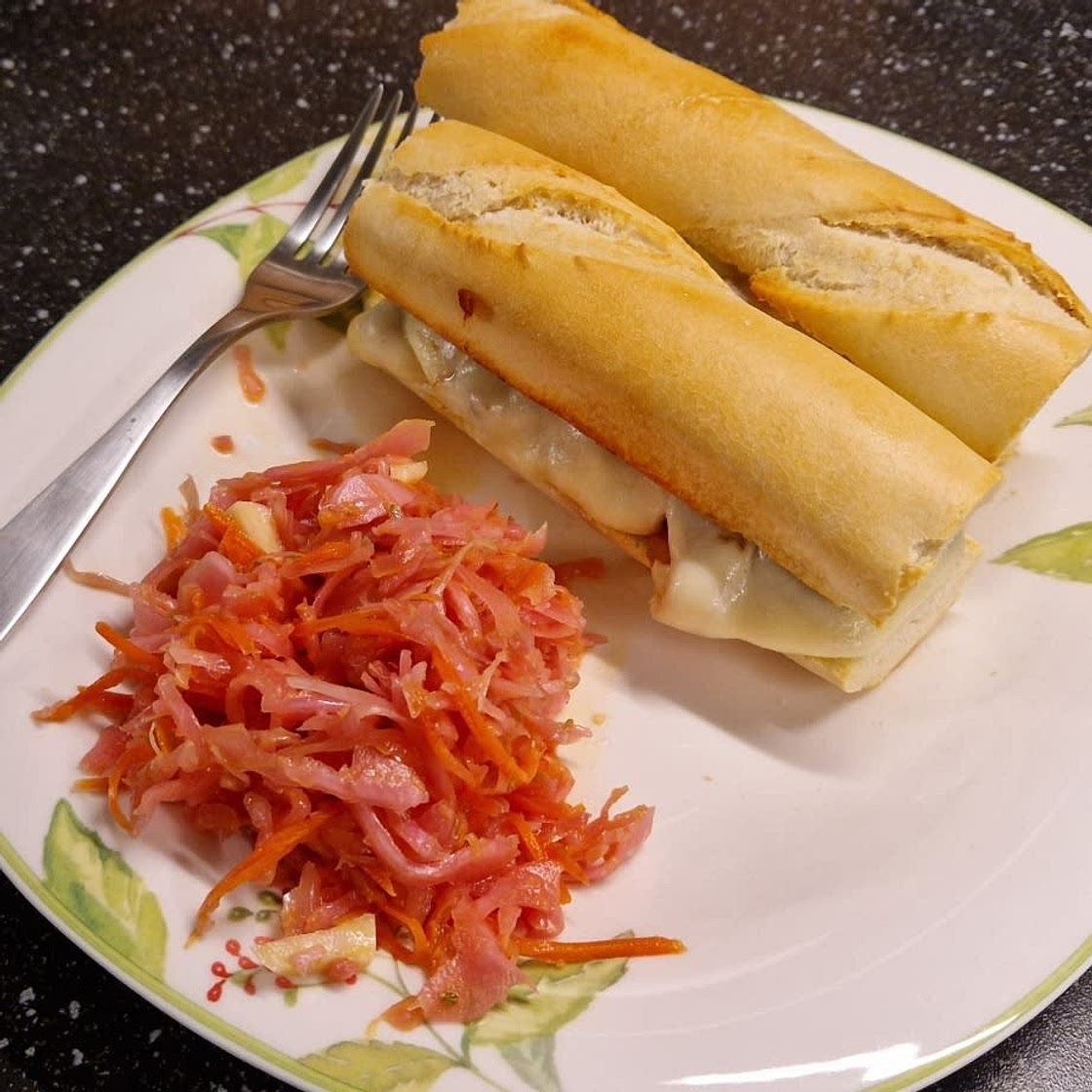 Zesty Gardein Vegetarian Meatball Sub With Melted Provolone, Sautéed Peppers, and Italian Slaw