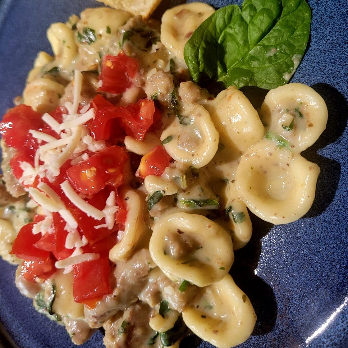 Spinach Cream Sauce with Turkey Italian Sausage Over Linguine
