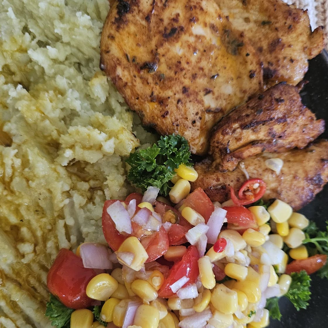 Cajun chicken with sweet potato mash and corn salsa