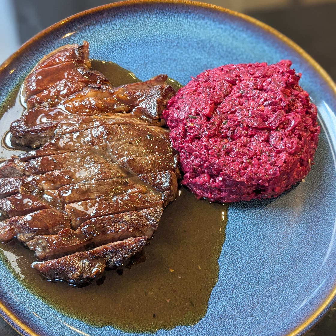 Rump steak and red wine sauce with beetroot and walnut salad