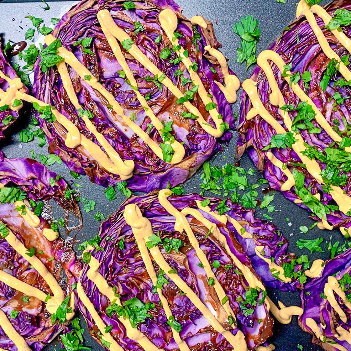 Roasted Red Cabbage Steaks With Red Pepper Tahini Sauce