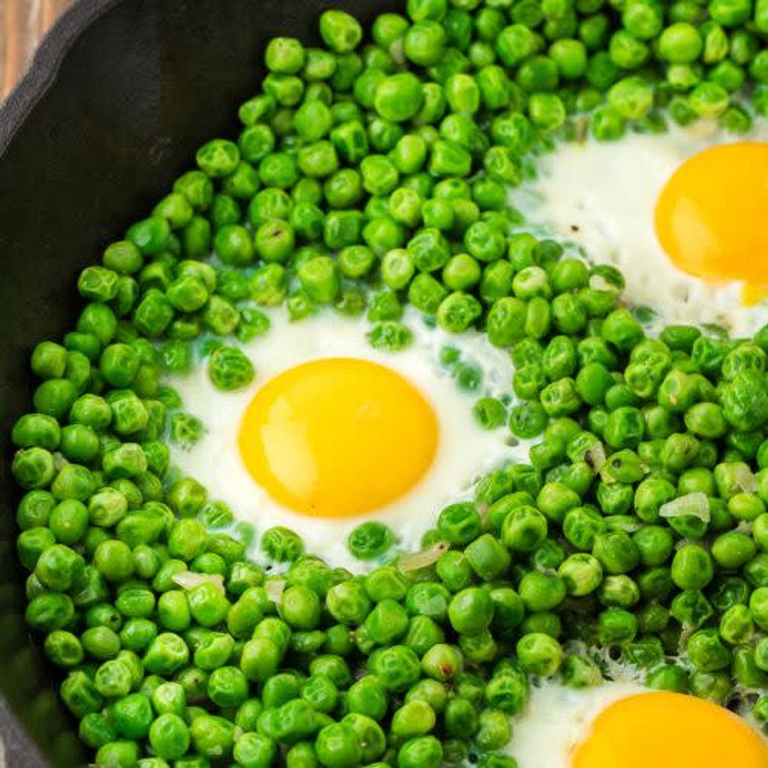 Pea Sauté with Poached Eggs