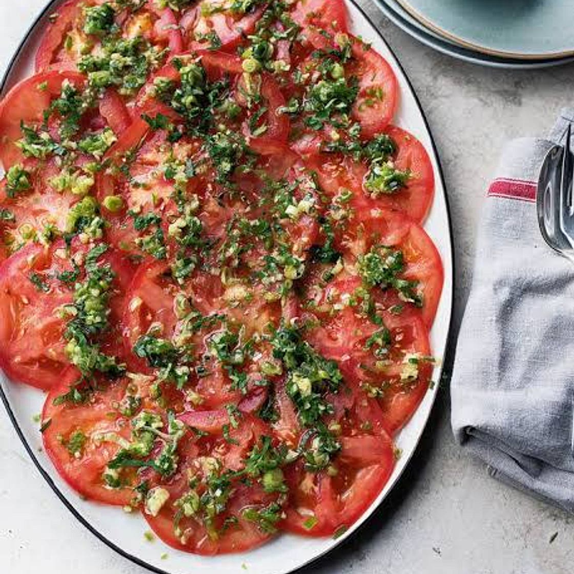 Beefsteak tomato carpaccio with green onions and ginger salsa