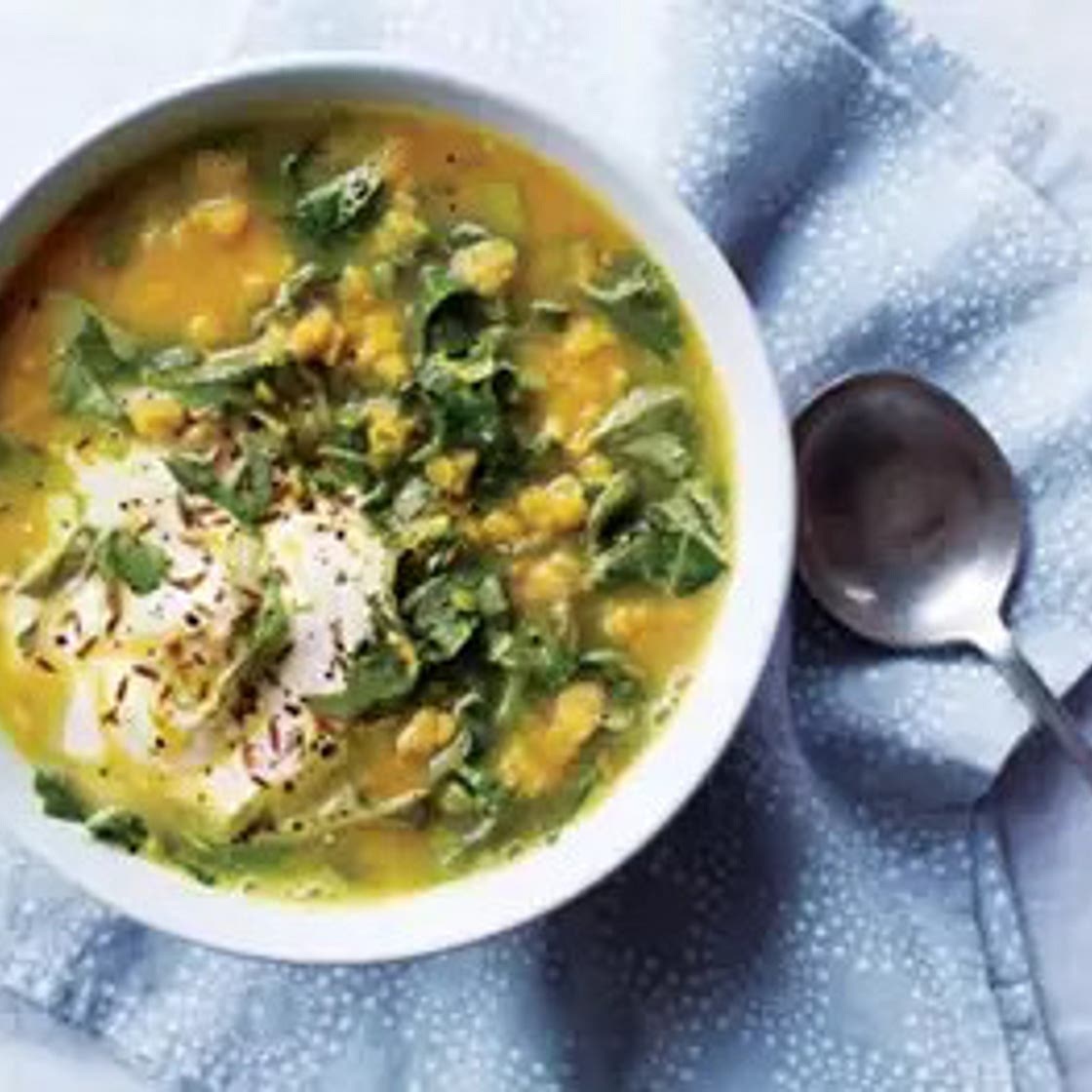 Spiced red lentil, turmeric and spring greens soup