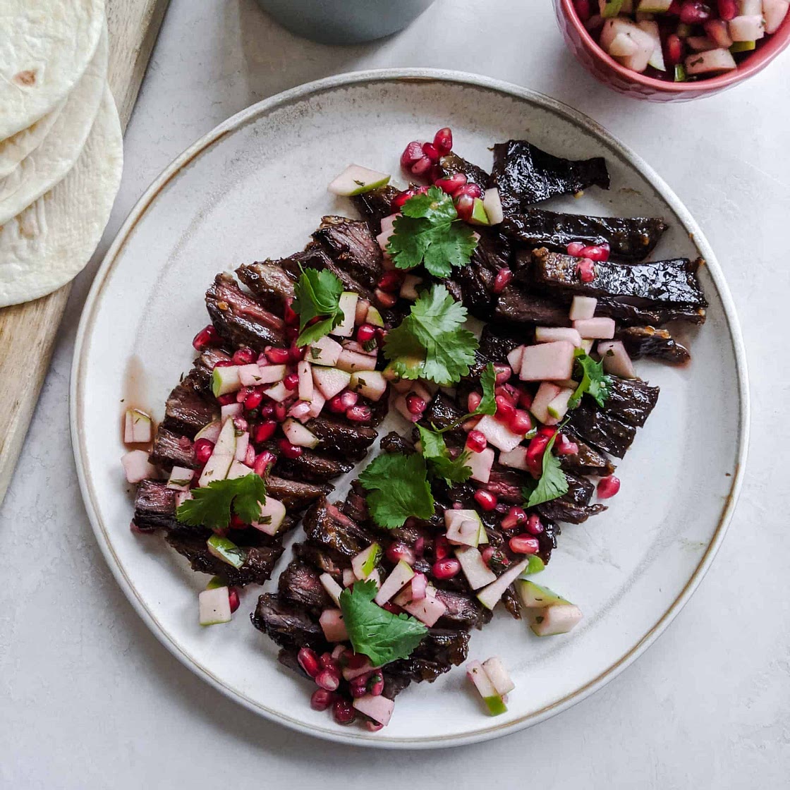 Pomegranate marinaded skirt steak