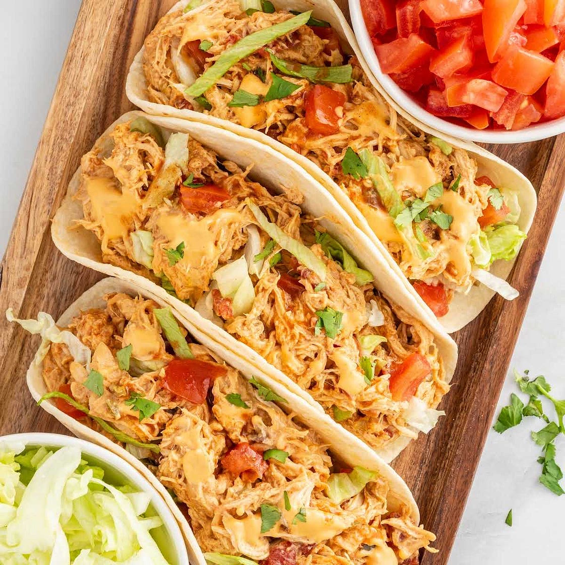Slow Cooker Queso Chicken Tacos