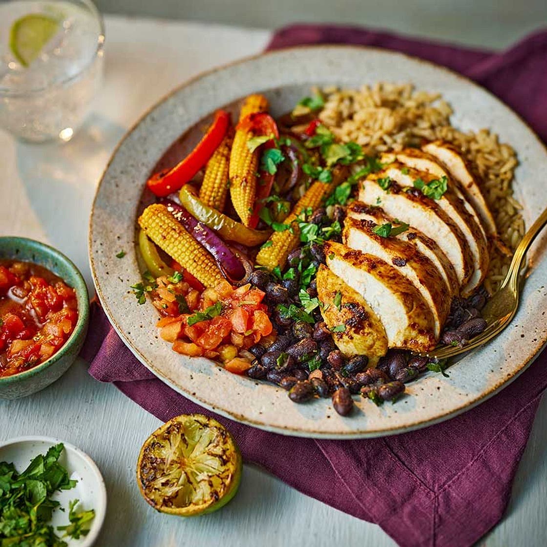 Fajita chicken rice bowl with burnt lime