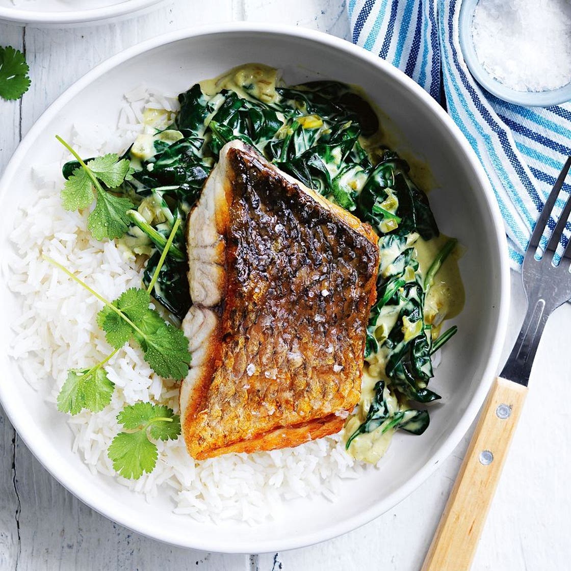 Barramundi with coconut creamed spinach and coriander