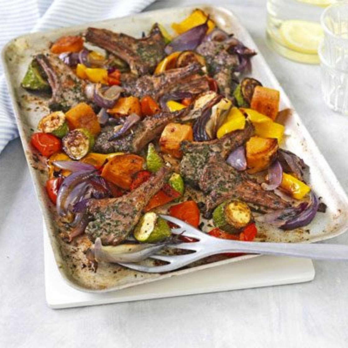 Herbed lamb cutlets with roasted vegetables