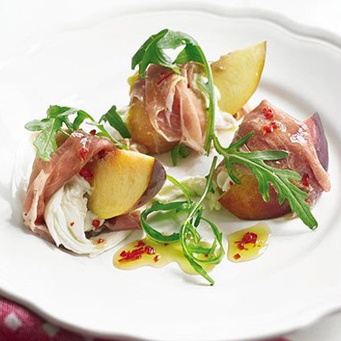 Prosciutto-wrapped peaches