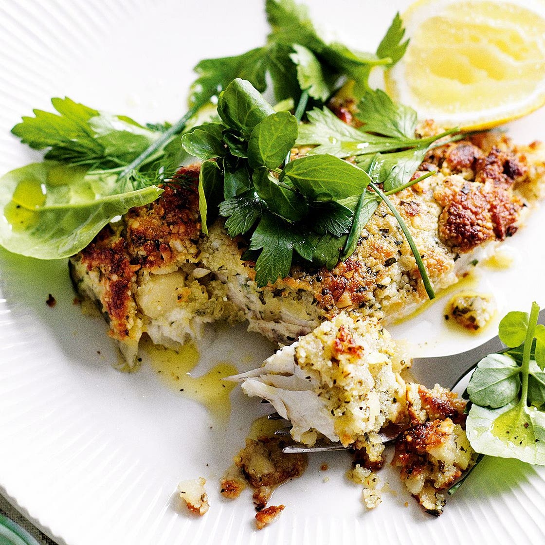 Macadamia-crusted fish with herb salad