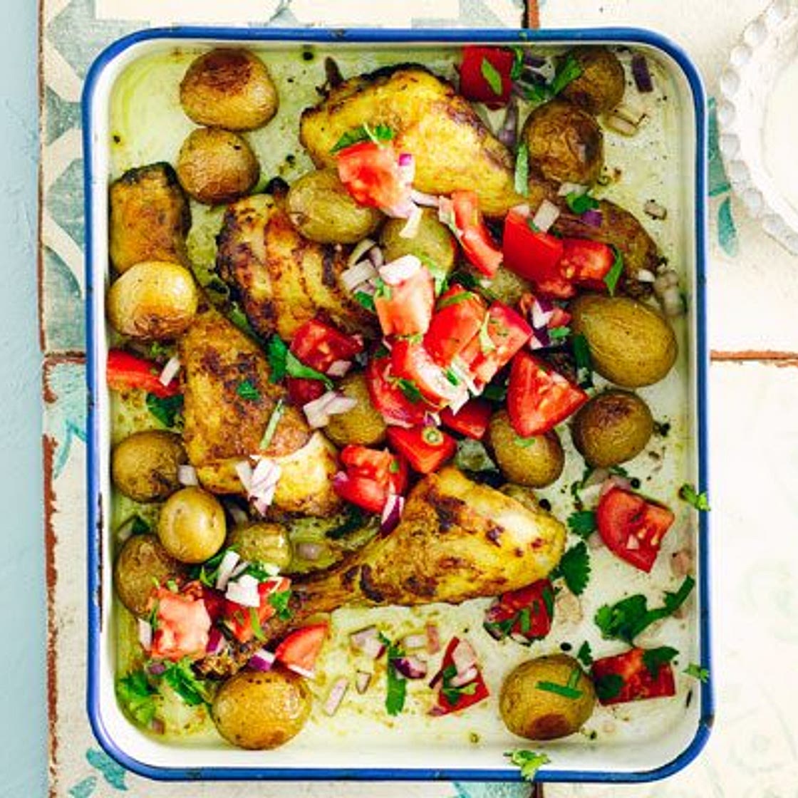 Curried chicken & new potato traybake