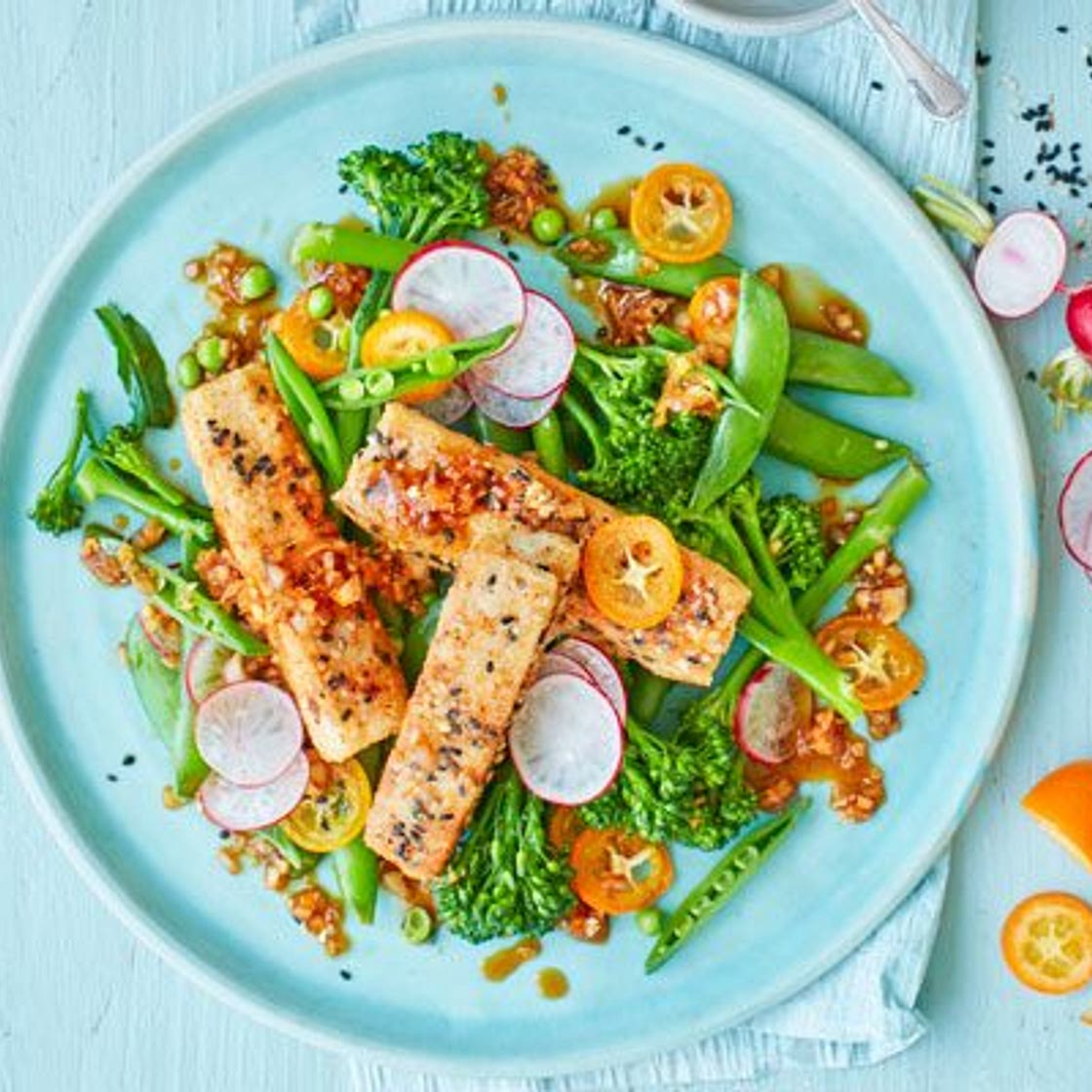 Spice-crusted tofu with kumquat radish salad