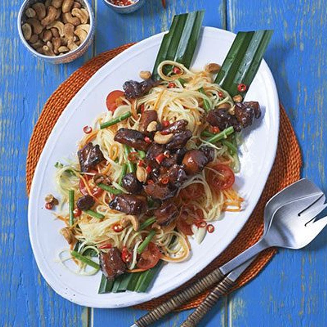 Sticky pork belly with green papaya salad & chilli lime dressing