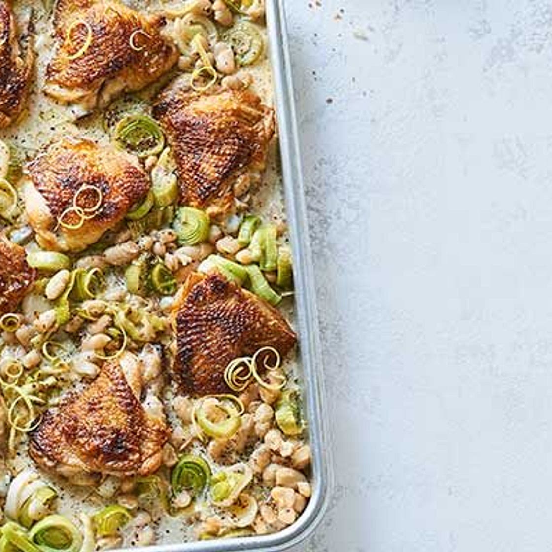 Creamy chicken, bean & leek traybake