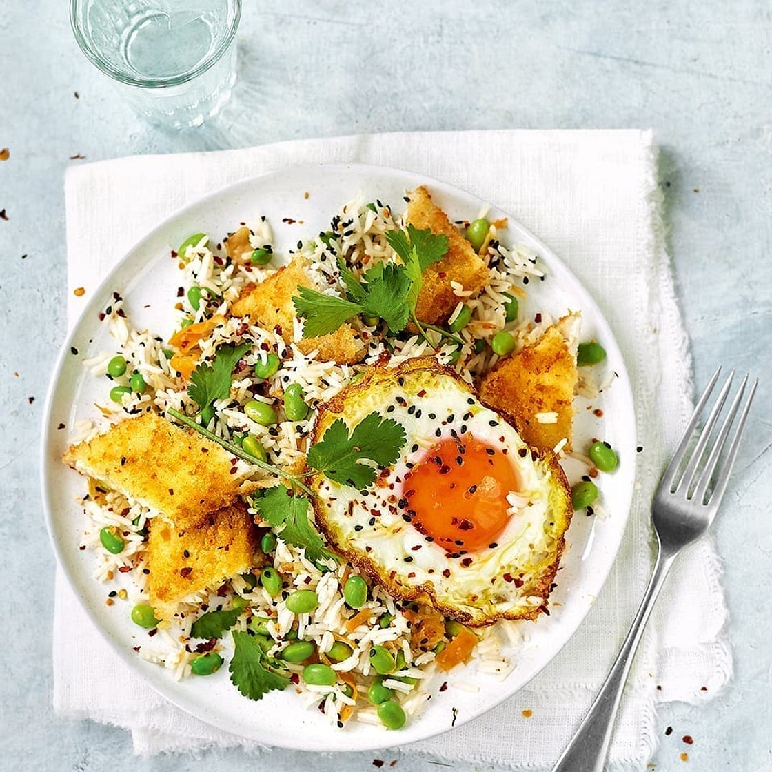 Fish finger kimchi rice with edamame and a fried egg