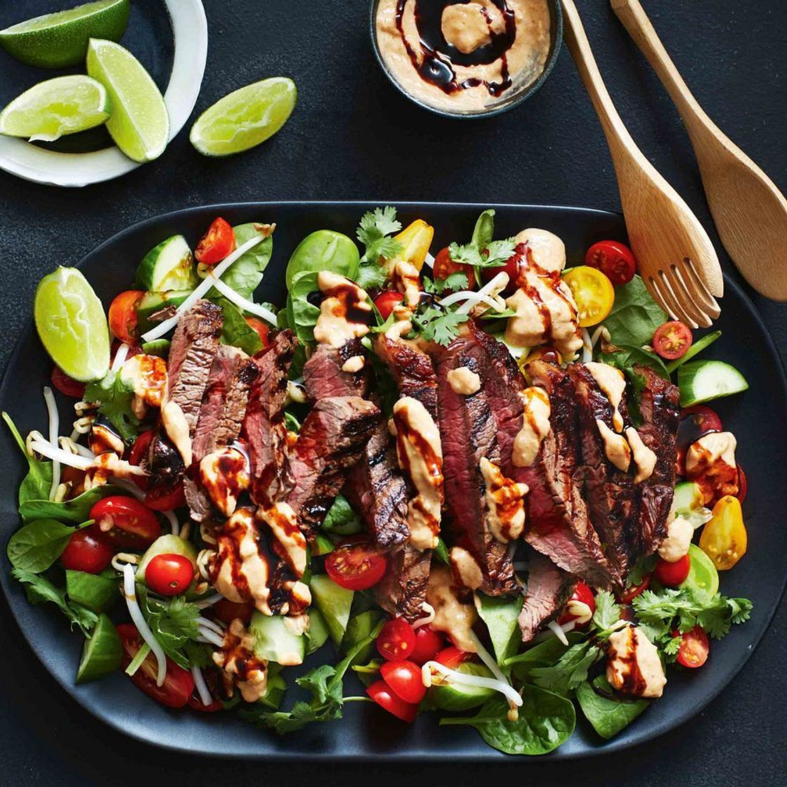Beef steak with satay sauce and sprout salad
