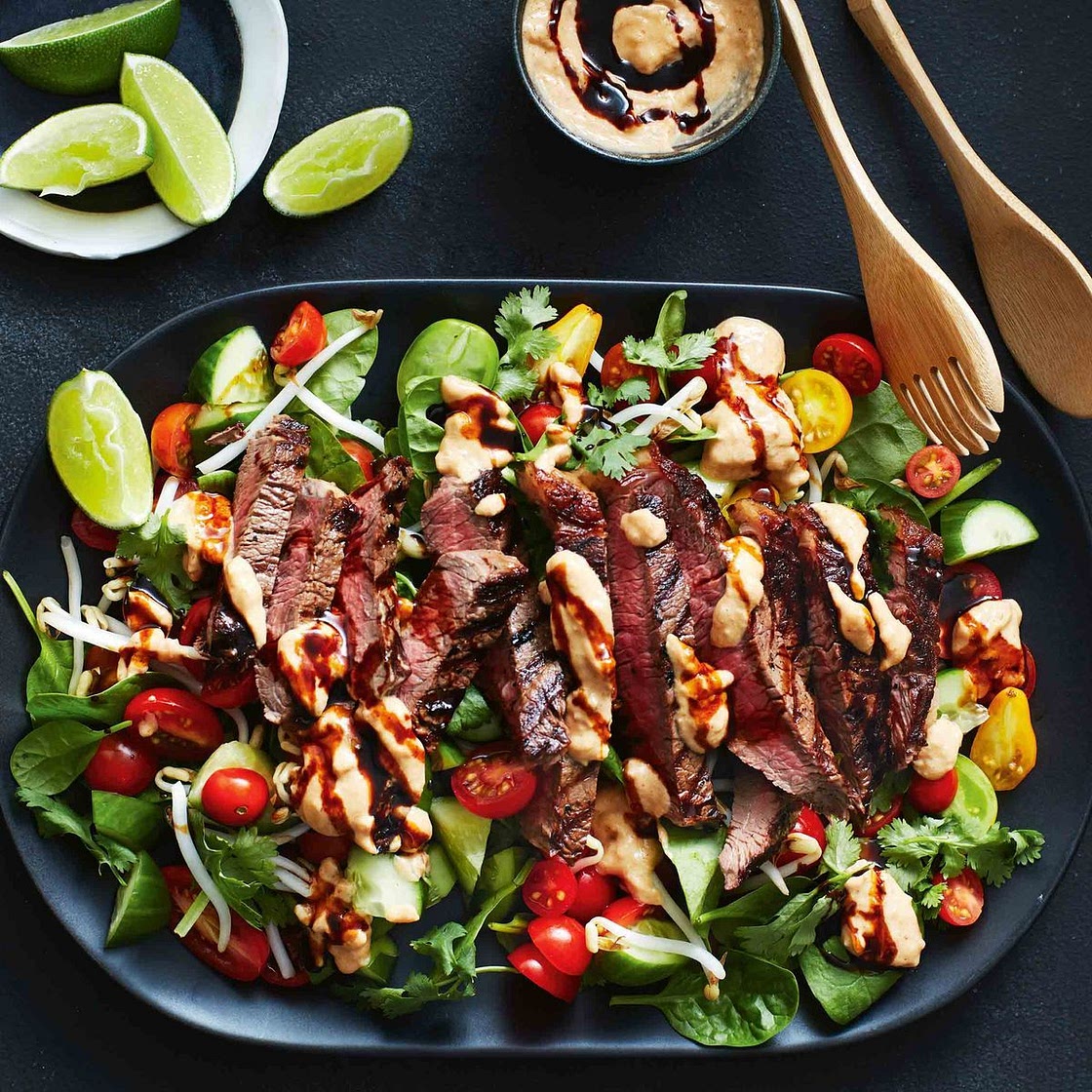 Beef steak with satay sauce and sprout salad