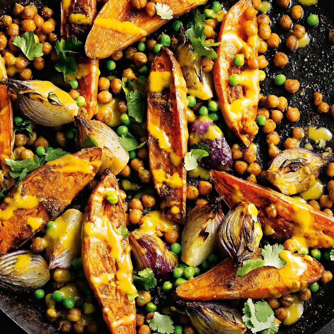 Spicy sweet potato and chickpea bake with lime tahini dressing