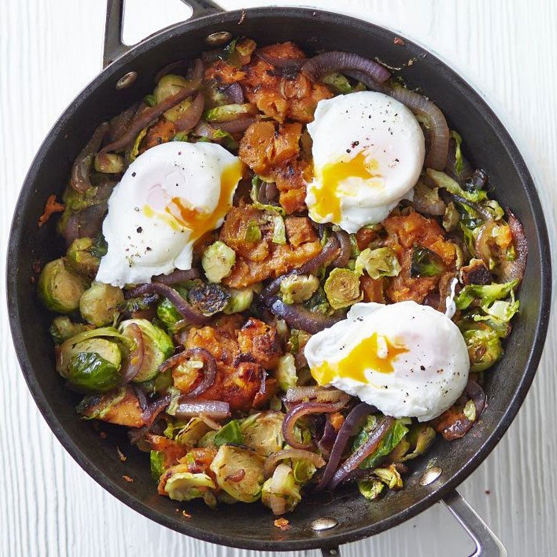 Sweet potato & sprout hash with poached eggs