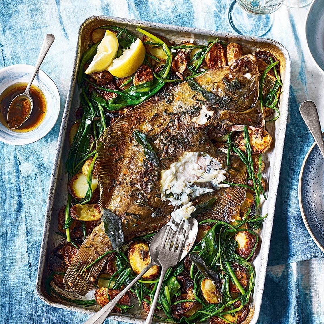 Whole roast plaice with anchovy and sage butter, new potatoes and sea vegetables