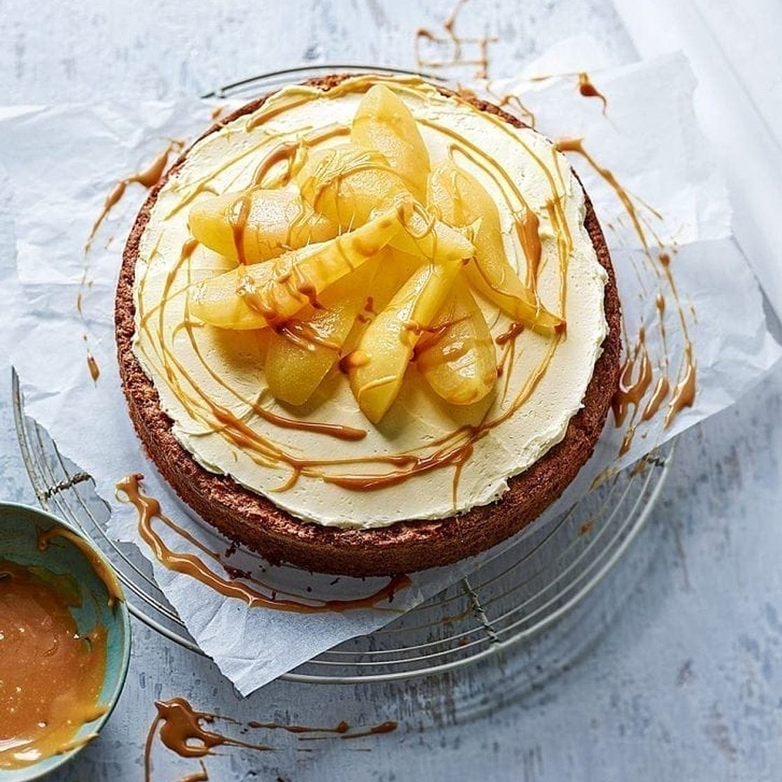 Poached pear cake with chai-spiced buttercream and salted caramel drizzle