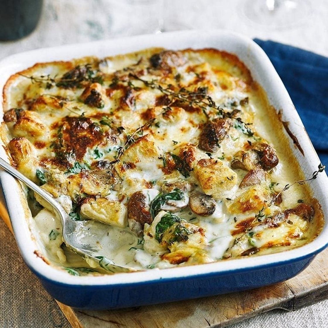 Baked gnocchi with cream, mushrooms and blue cheese sauce