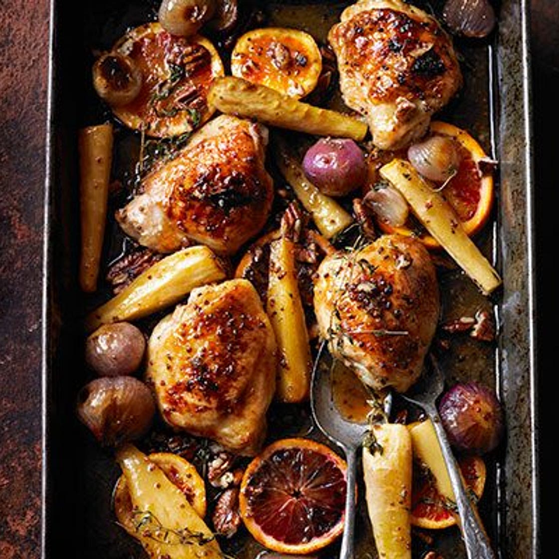 Sticky orange chicken with parsnips, maple & pecans
